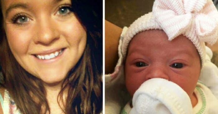 Mom straps baby in carseat